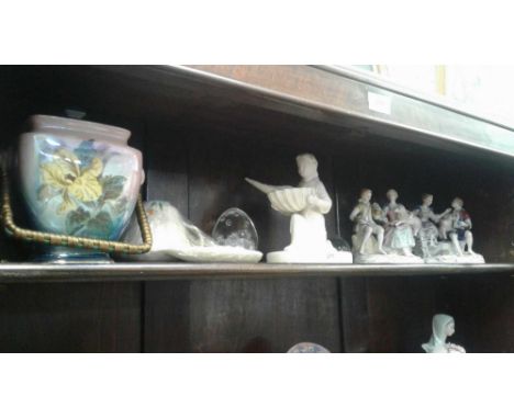 including a pair of Meissen style figures (damaged), two glass paper weights, Belleek kneeling angel (wing damaged), and Crow