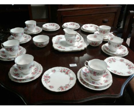 comprising of cups, saucers, side plates, cream jug, sugar bowl and sandwich plates (35) 