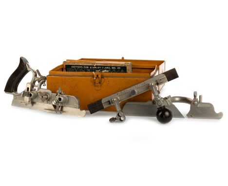 STANLEY, NO. 45 COMBINATION PLANE, housed in original tin box with attachments comprising six beading cutters, two match cutt