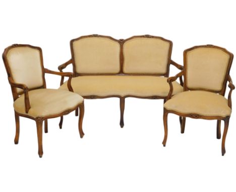 A stained beech three piece suite, in French style, comprising two seat sofa, with padded back and seat, on cabriole legs, an