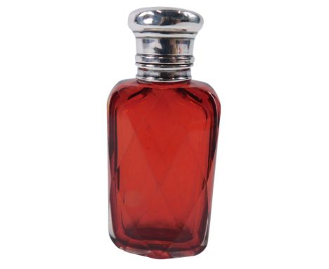 A Victorian ruby flash glass and silver topped scent bottle, the top unmarked, 8cm high. 