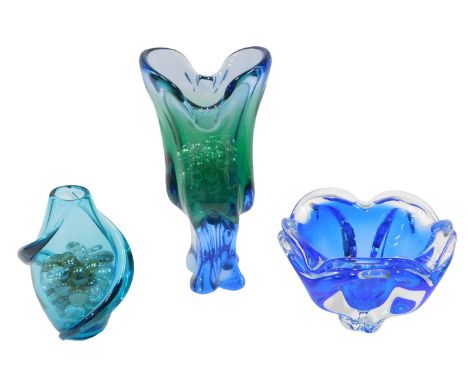 Three items of Art Glass, comprising a blue twist stem vase, 17cm high, a green and blue trumpet vase, 28cm high, and a blue 