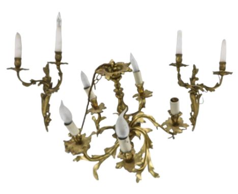 A cast brass five branch chandelier, decorated with foliate rococo scrolls, 40cm wide, (AF), and an associated pair of wall l