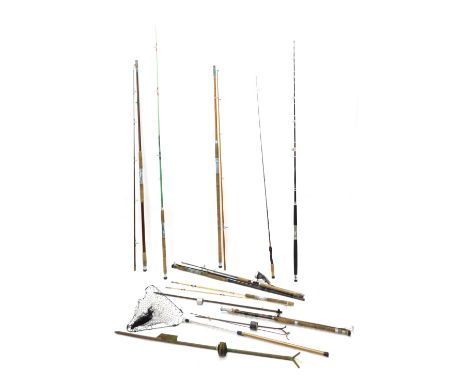 A quantity of fishing tackle, to include various rods, nets, mahogany and brass Scarborough type reel, other accessories, etc