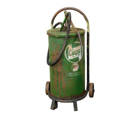 A Castrol oil drum on wheel support, painted in green, 87cm high. 