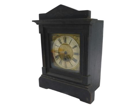 A late 19thC mantel clock, in black ebonised case, with brass dial with spandrels, the case with reeded columns, eight day mo