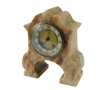 A French marble mantel clock, the dial with Arabic numerals, in a shaped case, with arched base, 25cm high.