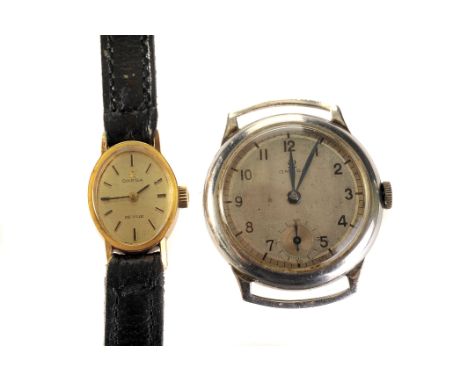 A 1930s Omega gentleman’s stainless steel wristwatch, the signed silvered dial with Arabic numerals, blued steel feuille hand