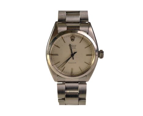 A 1960s Rolex Oyster Royal Precision gentleman’s stainless steel wristwatch, the silvered dial with applied baton numerals an