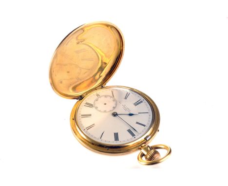 An 18ct gold full hunter pocket watch signed E.J Dent, the signed white enamel dial with black Roman numerals, blued steel sp