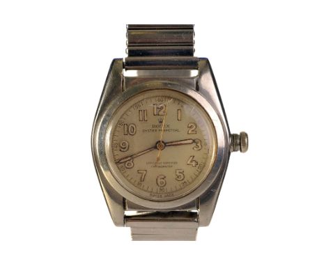 A 1940s Rolex Oyster Perpetual stainless steel bubble-back wristwatch, ref. 2940, case no. 396223, the silvered dial with out