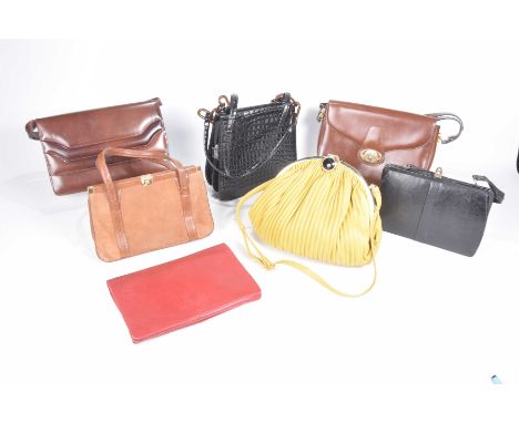 A collection of various ladies vintage handbagsTo include a Mappin & Webb black snake skin handbag, a ruby tan leather handba