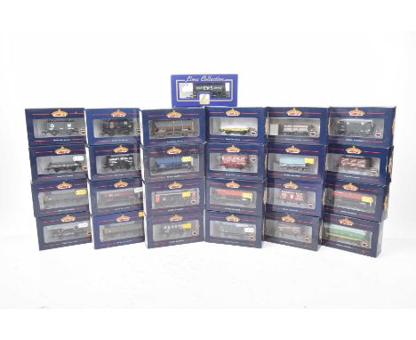 Twenty-five small boxed Bachmann '00' gauge wagons, tankers etc. of various types.