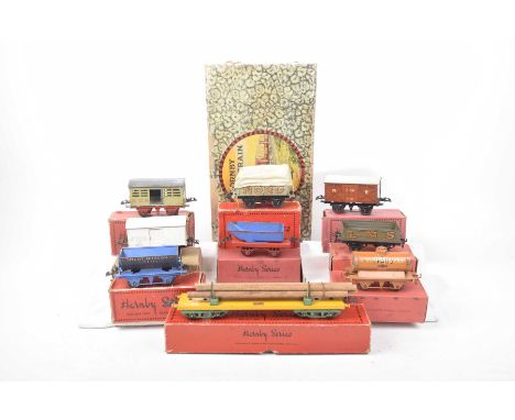 Nine boxed Hornby '0' gauge rolling stock items Comprising RS669 lumber wagon no. 2, Nord W606 open wagon with tarpaulin, Pra