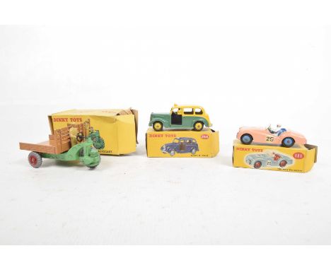 Three boxed Dinky toysComprising 342 (27G) motocart (Chariot Automobile) in green and brown, 254 Austin taxi and 111 Triumph 