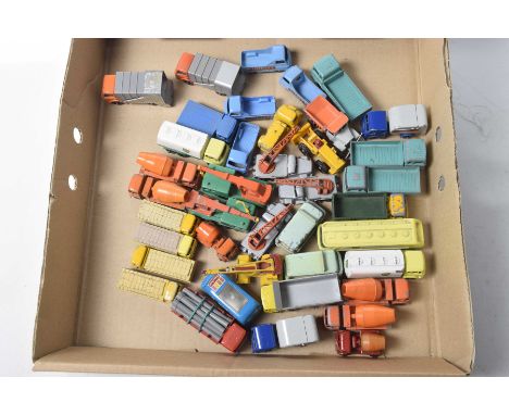Forty unboxed diecast Regular Wheel commercial vehiclesIncluding cement mixers, BP fuel tankers, milk vans, cement wagons, cr