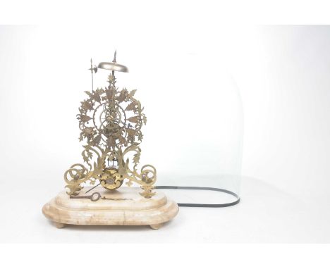 A 19th Century pierced brass skeleton clockThe pierced and cast foliate outer case enclosing single train movement striking o