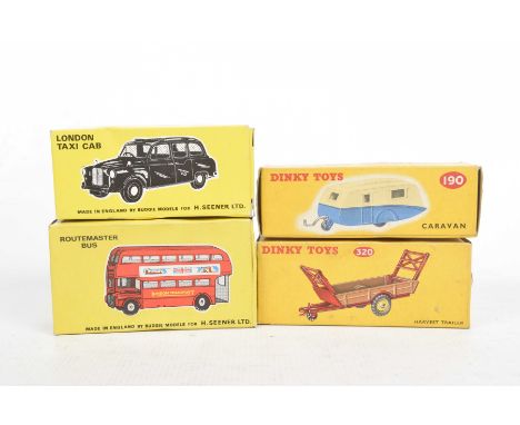 Four boxed diecast vehiclesComprising Dinky toys 190 caravan in orange and cream, 320 harvest trailer and Budgie 101 London t