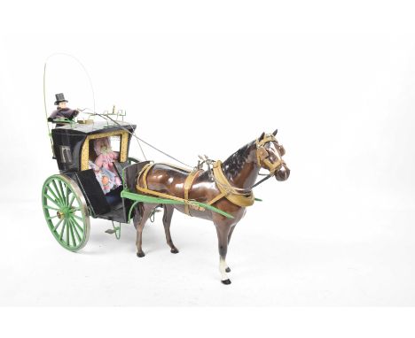 Beswick figure carriage group 
The Beswick bay standing horse applied with painted wooden and metal work carriage, together w