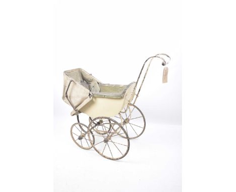A Victorian dolls pramWith metal frame, two seats and hood and two large and two small metal wheels and ceramic handle.