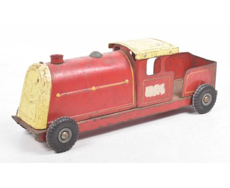 A Triang tinplate model push along train In red and yellow with black rubber wheels.