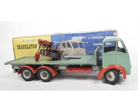 A boxed Shackleton F.G. vehicle in the form of a flatbed lorryIn light green with red fuel tanks, mud guards and light grey c