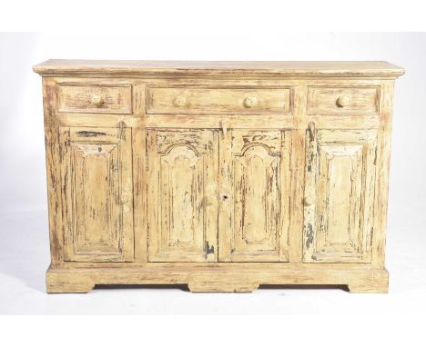 A French country style painted hardwood sideboardWith an arrangement of three frieze drawers over a pair of panelled cupboard