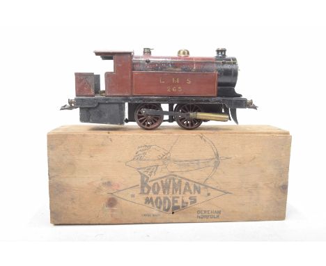 A boxed Bowman '0' gauge model no. 265 0-4-0 tank locomotive Live steam, no. 265 in maroon LMS livery, with leaflet.