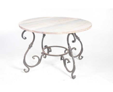 A contemporary hardwood and iron patio tableThe substantial circular painted slab top supported on four S shaped iron support