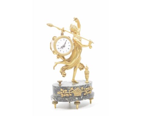 A French ormolu figural mantel clockModelled in the form of a classical lady supporting a circular clock face with Roman nume