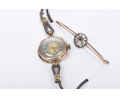 An opal and garnet spider bar broochStamped 9ct, together with, a 9k gold manual wind wrist watch AF, weight approx. 3.5g (2)