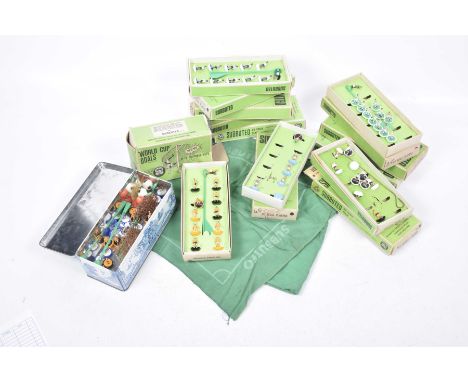 A quantity of Subbuteo football itemsIncluding twelve boxed teams, box of cup goals, pitch cloth and a few unboxed items.