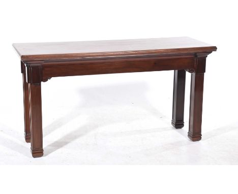 A Victorian mahogany Gothic influence side or console tableThe rectangular moulded top above a plain frieze raised on archite