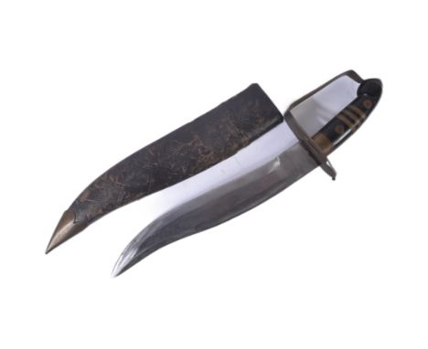 A vintage Indian variation of a Nepalese / Gurkhas Kukri knife. The knife having a hooked pommel with a x3 bar stirrup shaped