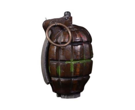 An original WWII Second World War British Army issue No. 36 Mills Bomb hand grenade. Inert, but a complete example with with 