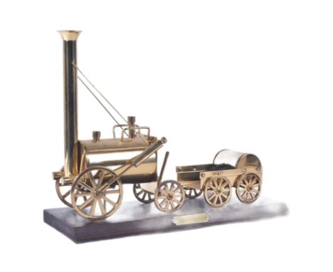 Stephenson's Rocket - a vintage stationary model of a Stephenson's Rocket locomotive. The loco with a 0-2-2 wheel arrangement