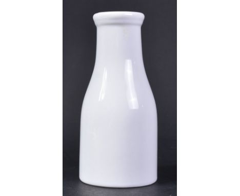 A WWII Second World War Third Reich Nazi German Waffen SS Milk Bottle. White glossed ceramic of typical form with SS runes to