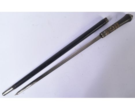 A 19th Century Victorian gentleman's sword stick / walking cane with concealed blade. The stick with lions head to the pommel