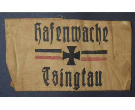 A WWI First World War Imperial German Army / Prussian Army Tsingtau / Tsingtao Harbour Guard armband. Central Iron Cross betw