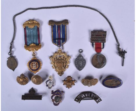 A collection of assorted medals, badges and other similar items to include; a hallmarked gilt silver Masonic medal engraved '