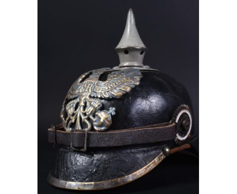A WWI First World War Imperial German Army / Prussian M15 pickelhaube uniform helmet. Leather construction with nickel / meta