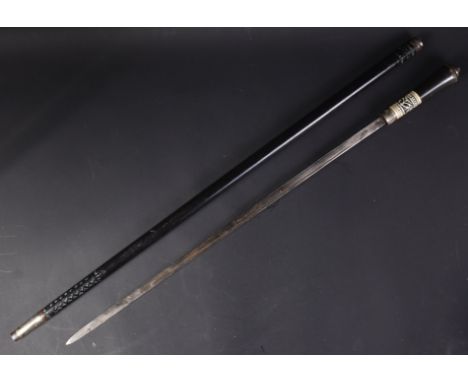 A 19th Century Victorian gentleman's sword stick / walking cane with concealed blade. The stick with lions head to the pommel