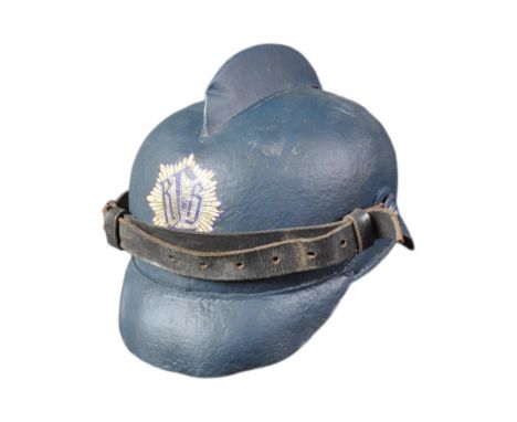 A pre WWII Second World War (circa 1930) Third Reich Nazi German Air Raid Warden helmet. A painted blue leather example with&