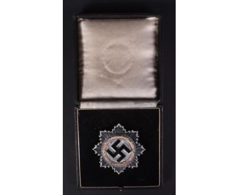 A WWII Second World War Third Reich Nazi German related ' Deutsches Kruez ' ( The German Cross ) medal. The German Cross bein