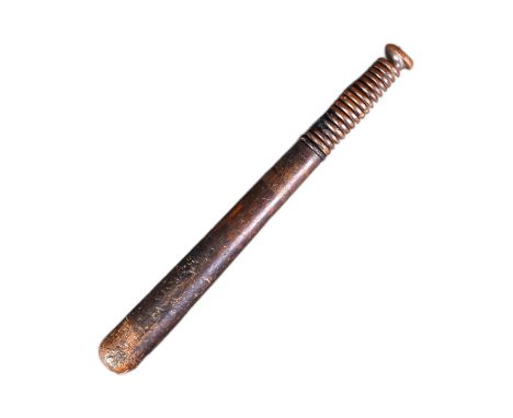 A 19th Century Victorian Police truncheon / tipstaff with concealed blade. Ribbed wooden grip unscrewed at the waist to revea