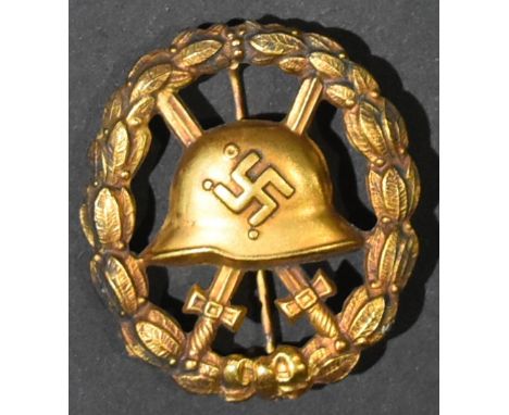 A pre WWII Second World War / Spanish Civil War period German Condor Legion wound badge. The badge being a voided gold 1st Cl