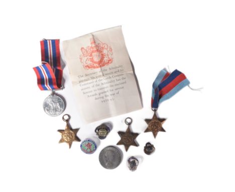 A collection of assorted WWII Second World War British medals and British Legion enamel pin badges. Medals comprising 1939-45