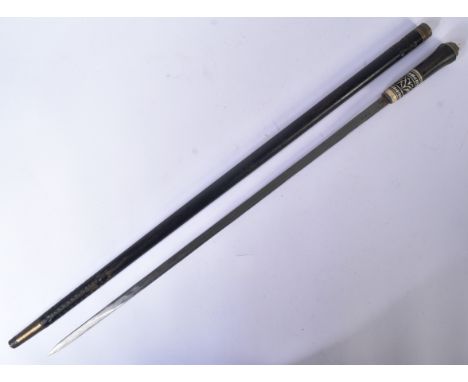 A small 19th Century Victorian gentleman's sword stick / walking cane with concealed blade. The stick with lions head to the 