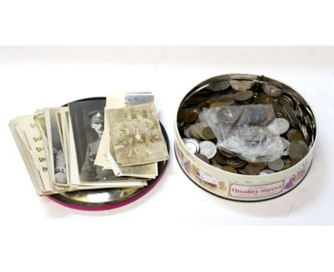 A collection of WW1 British photographs and postcard portrait photos, Mainly Royal Artillery, MGC, etc. Along with a tin of c