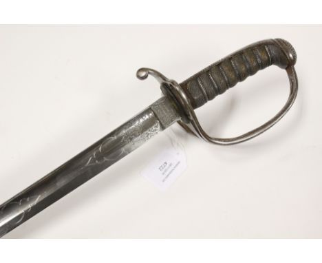 British Light Cavalry Sword made by Wilkinson Sword. Serial number 11132. 87cm bright steel etched blade dedicated to the Que